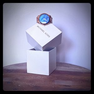 Michael kors gold watch blue face plate